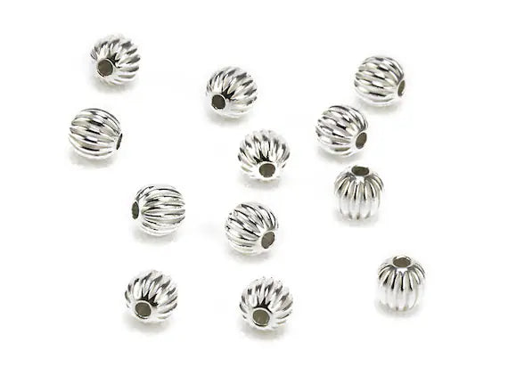 4mm - Metal Beads Corrugated Silver Plated · 100 pcs