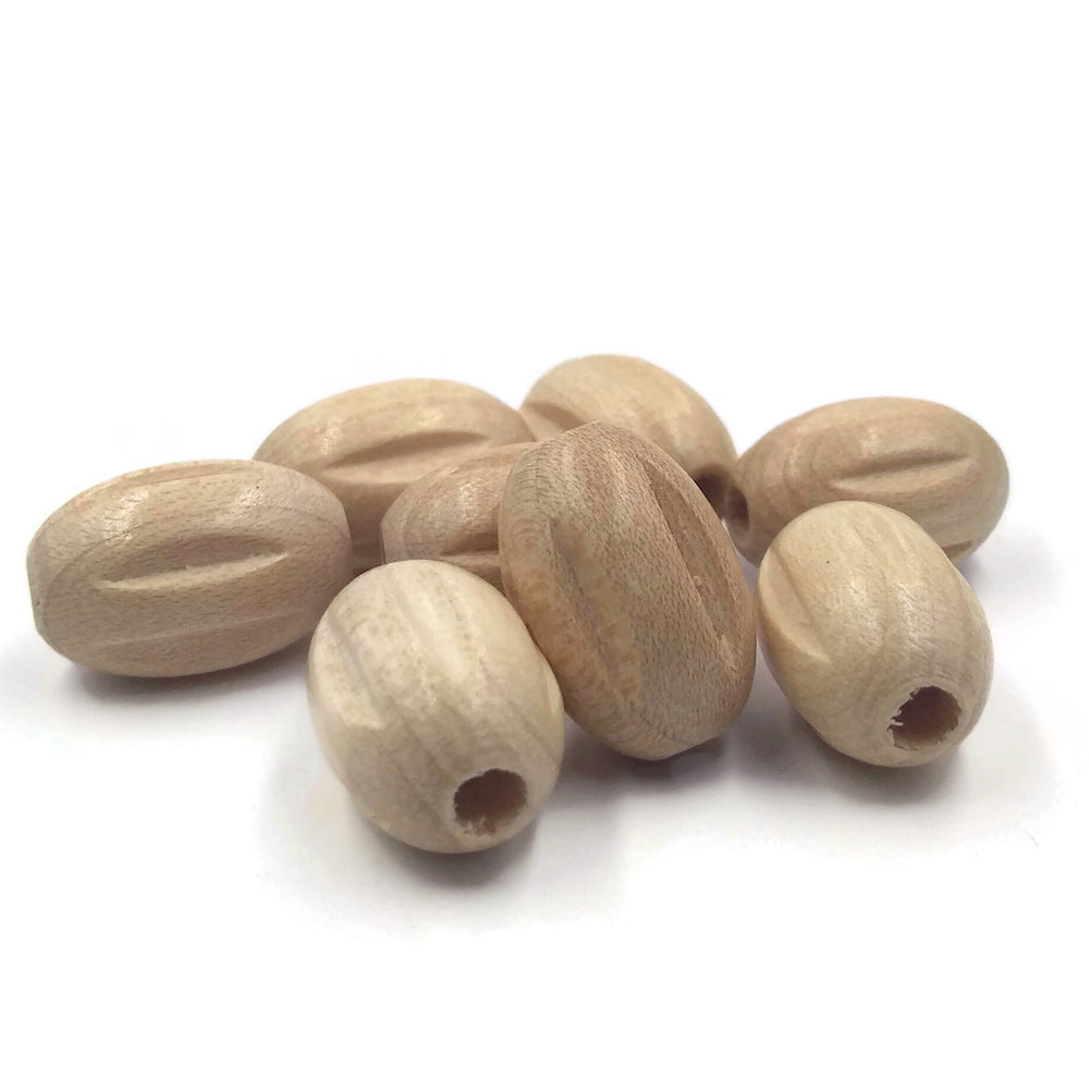 10x15 mm - Wooden beads carved and oval