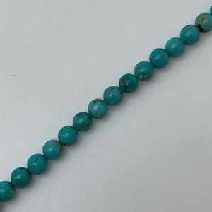 Perle semi-précieuse sur corde - Turquoise