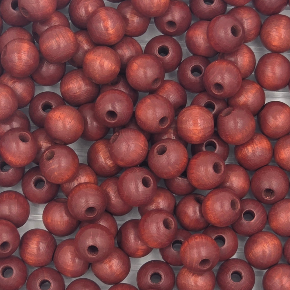 10 mm -  Perles de bois · Quantités et couleurs variées